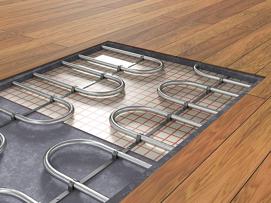 Serpentine di un impianto a pavimento sotto il parquet